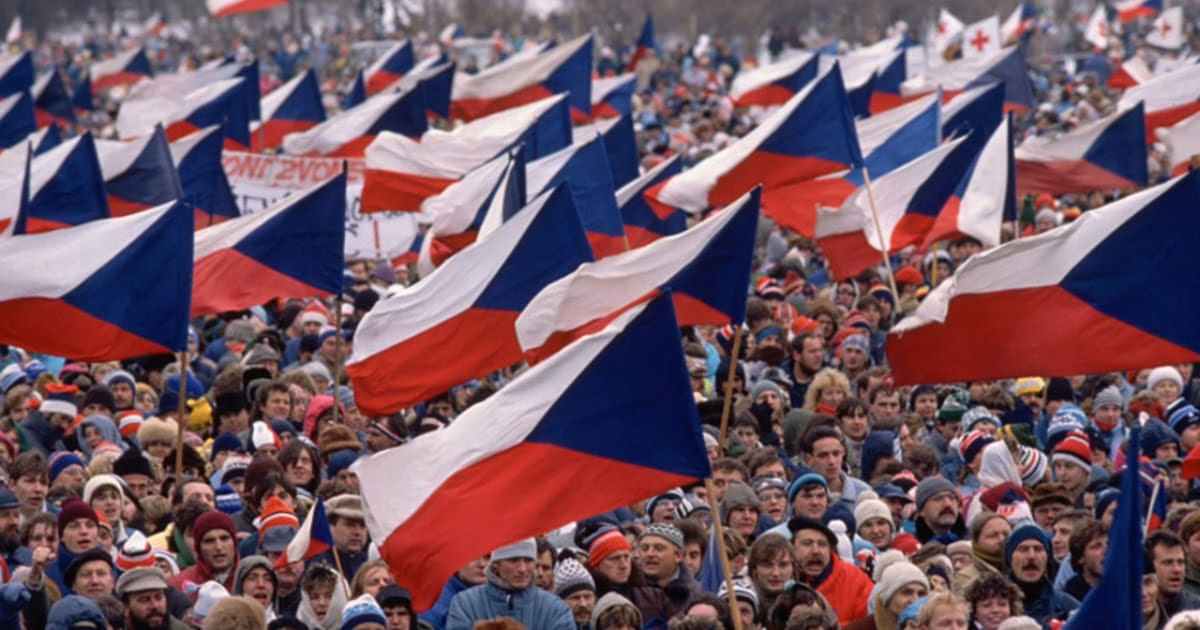 November 17th - Czech flags in a large crowds in a Velvet Revolution